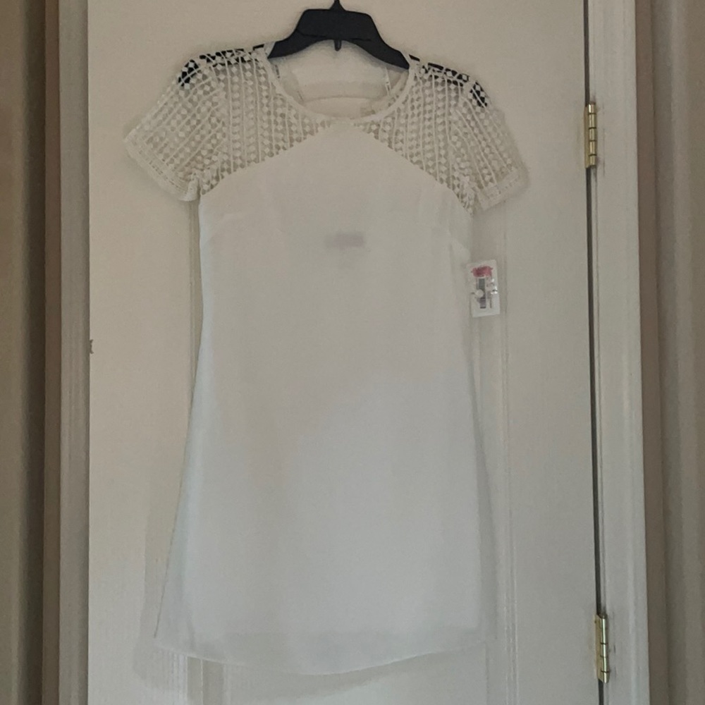 Short white dress with crochet top